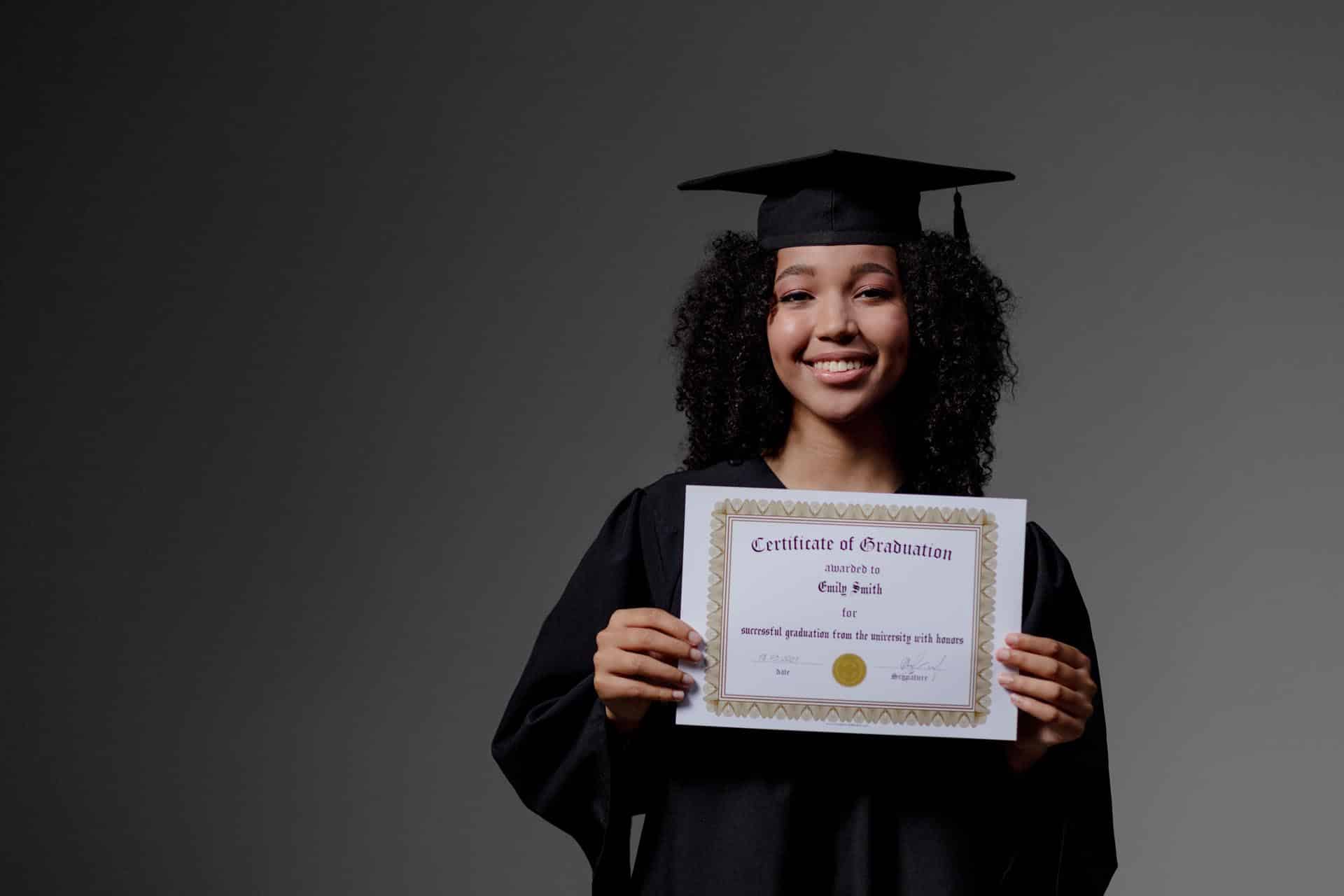Adult student smiling while studying for the GED exam
